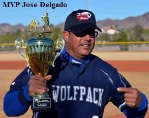 MVP Jose Delgado Holding a Trophy