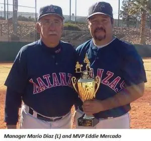 Manager Mario Diaz and MVP Eddie Mercado Holding a Trophy