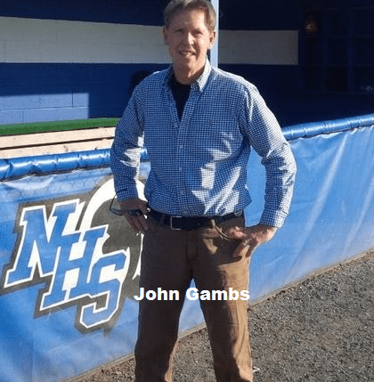 John Gambs Standing on a Field