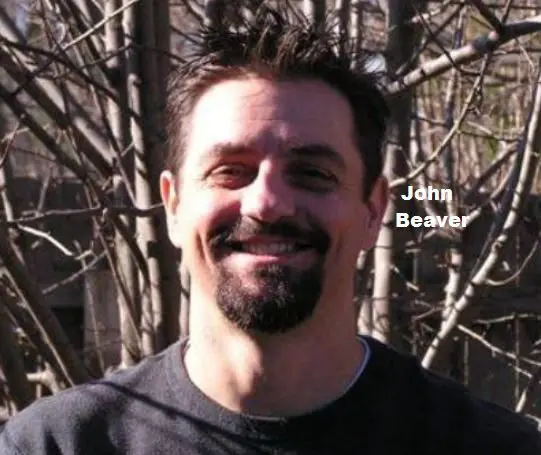 John Beaver Smiling Portrait With Woods Background