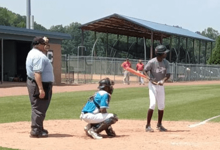 Two Players Playing on a Baseball Field