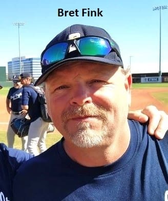 Bret Fink, man wearing sunglasses and baseball cap.