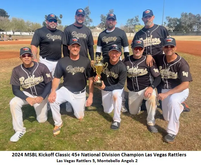 A baseball team celebrating with a trophy, wearing uniforms labeled "rattlers," on a sunny field with the score "las vegas rattlers 5, montebello angels 2" displayed.