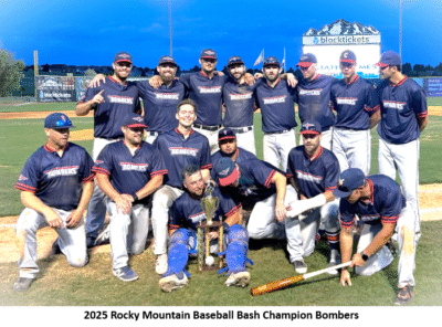 Baseball team celebrating with a trophy.