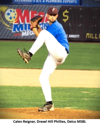Baseball pitcher in action on field.