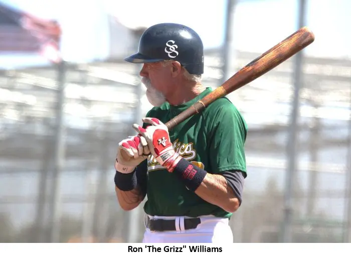 Baseball player preparing to bat.