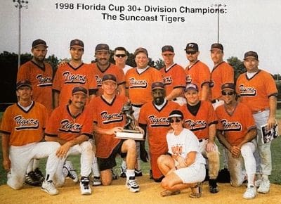 Red cardinal bird mascot logo with a fierce expression.